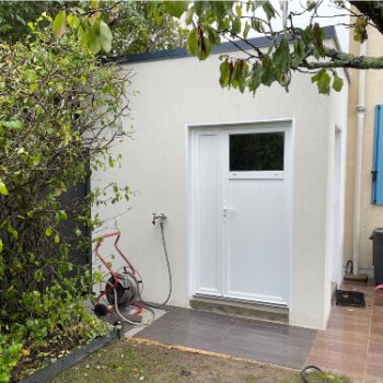 Annexe de jardin en béton enduit Toit Terrasse
